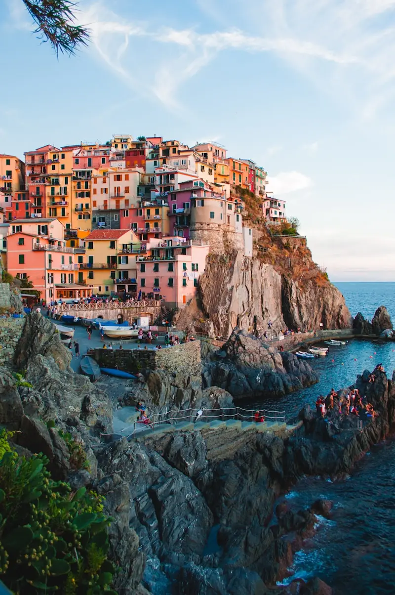 Colorful houses stacked on an Italian hillside